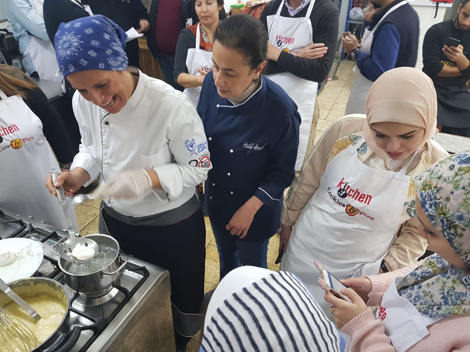 Hadil teaching culinary class